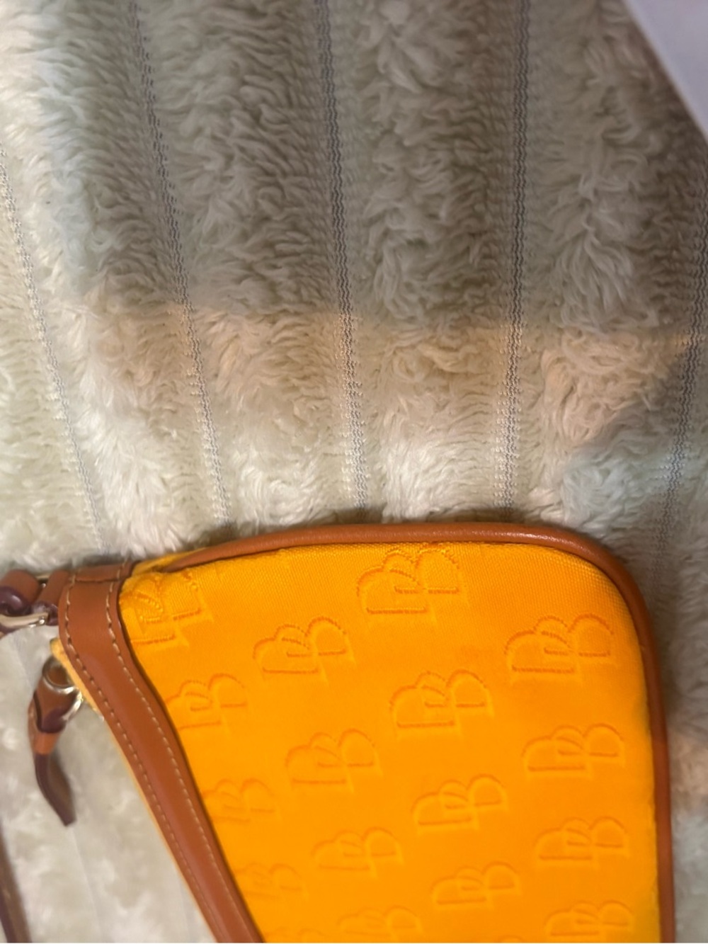 Dooney & Bourke Dandelion Coated cotton/orange Embossed DB Wristlet w/Brown Trim - Picture 4 of 8